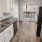 a kitchen with a wood floor