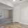 a small room with wood-style flooring